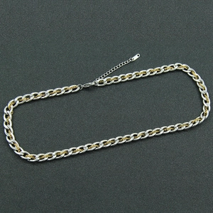 Collier à maillons cubains bicolores or et argent avec design superposé style tendance