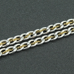 Bracelet chaîne cubaine bicolore en acier inoxydable argent et or pour un look street chic