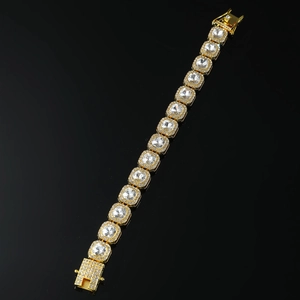 Close-up of hip hop cuban chain with square rhinestones and iced out clasp details