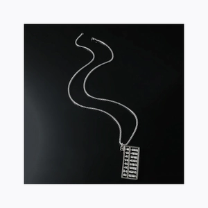 Silver abacus pendant necklace with movable beads on sleek black mirror background