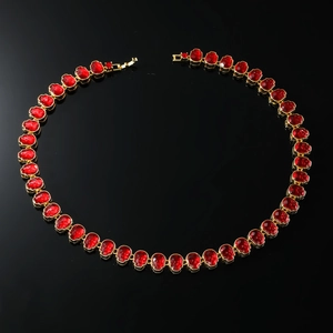 Hip hop sugar chain necklace with red faceted skull pendants and gold-tone lobster clasp