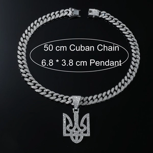 Close-up of silver iced out Tryzub pendant with 50cm Cuban chain necklace for men