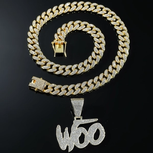 Hiphop gold Cuban chain necklace featuring an iced-out WOO letter pendant with zircons