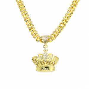 Iced out gold Cuban link necklace with crown pendant featuring KING inscription