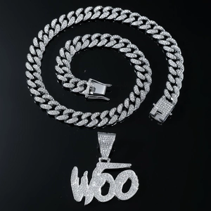Iced out silver Cuban link chain with sparkling diamond-encrusted WOO letter pendant