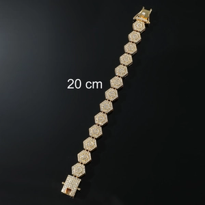 Detailed view of 20 cm gold iced-out hip hop bracelet with rhombus links and micro pave crystals