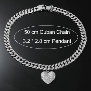 Zilveren iced out Cuban ketting met hart hanger en sprankelende strasstenen afwerking