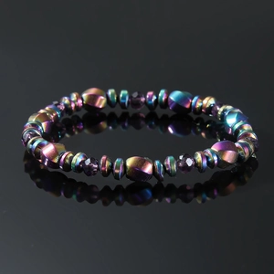 Rainbow hematite magnetic bracelet with colorful geometric beads on black reflective surface