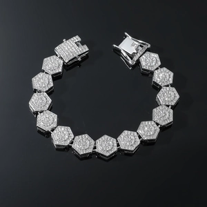 Detail of hip hop rhinestone bracelet with silver-tone hexagonal links and secure clasp