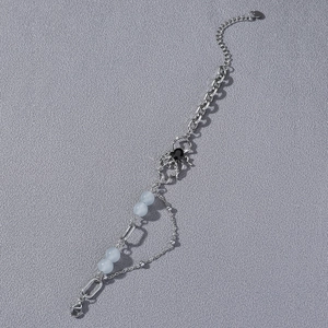 Bracelet chaîne araignée hip hop avec pierre noire et perles bleu clair pour femme