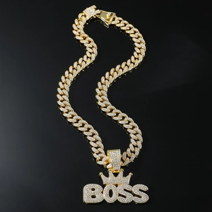 Hip-hop gold Cuban link necklace featuring a crown BOSS letter pendant with micro-pave crystals