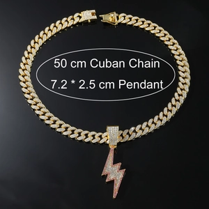 Macro view of iced-out lightning bolt pendant with cuban chain size 7.2x2.5 cm