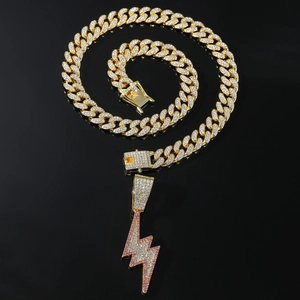 Hip-hop gold Cuban link necklace with iced out two-tone lightning bolt pendant