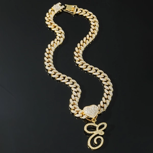 Gold-plated iced out Cuban link necklace with heart link and large letter E pendant