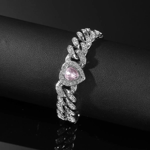 Iced out Cuban link bracelet with a pink heart centerpiece and sparkling crystals