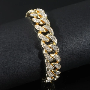 Iced out gold Cuban link bracelet with sparkling rhinestones in a luxury hip hop style