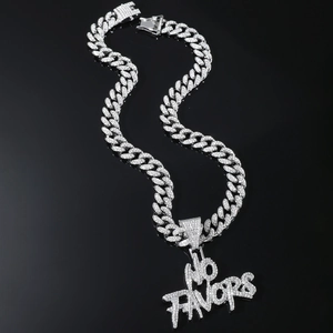 Close-up of ice-out Cuban link chain with NO FAVORS crystal letter pendant in silver finish