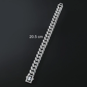 Diamond-encrusted 13mm Cuban link bracelet with dollar sign clasp in 20.5 cm length