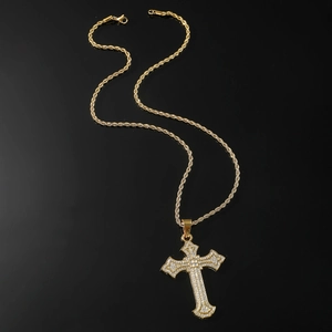 Iced out gold cross pendant necklace with rope chain for hip hop style on black background