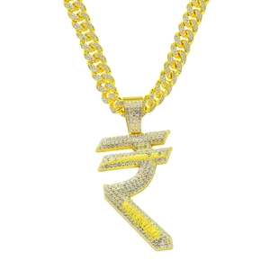Close-up of hip hop gold Cuban chain with large iced-out rupee symbol pendant details