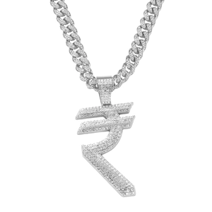 Macro shot of silver hip hop necklace with iced-out Rupee symbol pendant and Cuban link chain