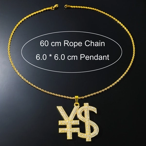 Close-up of hip hop pendant with dollar and yen symbols encrusted with clear zircons