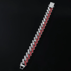 Detailed close-up of 15mm hip hop Cuban link bracelet with red and white inlaid diamonds