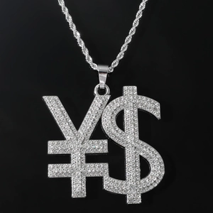 Close-up of iced out dollar and yen sign pendant with silver rope chain for men