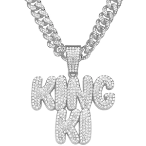 Iced out King Ki pendant necklace with Cuban chain and cubic zirconia in hip hop style