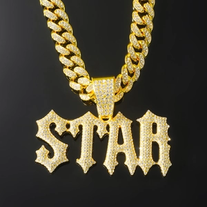 Hip hop style gold Cuban chain necklace with a STAR letter pendant iced out in crystals