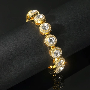 Gold-plated Cuban chain bracelet featuring round-cut cubic zirconia in a paved halo design