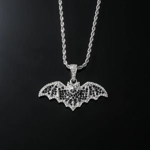 Gothic silver bat pendant necklace with black and white crystals on a sleek rope chain
