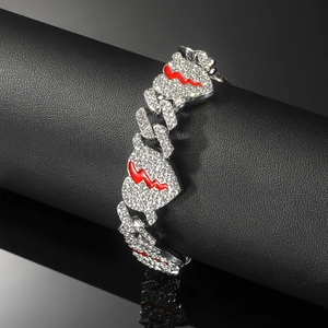 Hiphop silver Cuban link bracelet with iced-out heart pendant and red lightning detail