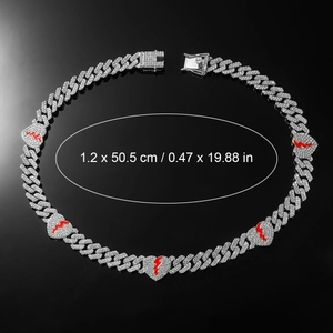 Detail of 12mm iced out Cuban chain with red broken heart charm and size markings