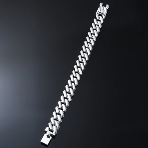Polished silver cuban link bracelet for men featuring a secure square clasp closure