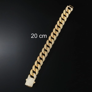 Detail of 20cm gold Cuban link bracelet with diamond encrusted square clasp