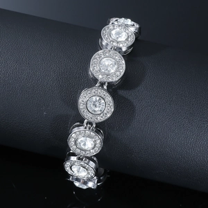 Detail of silver-tone hiphop bracelet with iced-out circular links and crystals