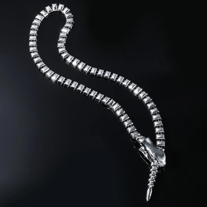 Silver modular snake chain necklace featuring geometric links and a sleek metallic finish