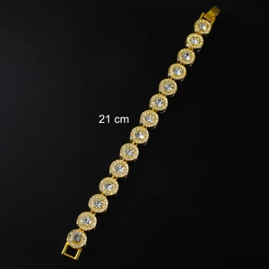 Detail of 21cm gold hip hop bracelet featuring iced out circular links with diamonds