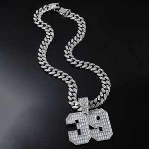 Close-up of hip hop silver finish number 39 pendant with iced-out pave rhinestones