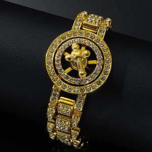 Bracciale hip-hop dorato con croce rotante e cristalli scintillanti su base nera