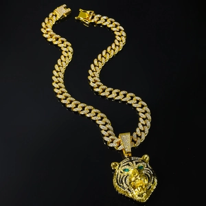 Hip-hop gold plated Cuban link necklace with iced out lion head pendant and green eyes