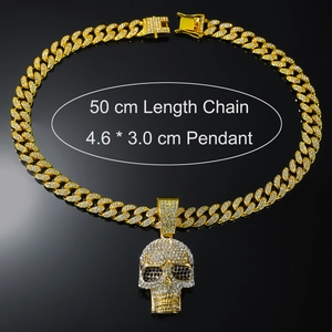 Close-up of gold iced-out skull pendant with dimensions and 50cm chain length detail