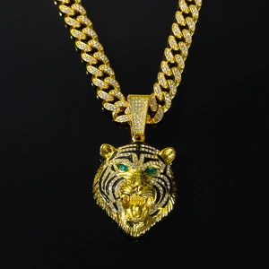 Hip hop gold lion head necklace with green eyes and white cubic zirconia crystals