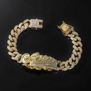 Iced out gold Cuban link bracelet with St. Jude religious pendant and full pavé crystals