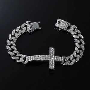 Men's hip hop silver iced out cuban chain bracelet featuring a large pavé cross pendant