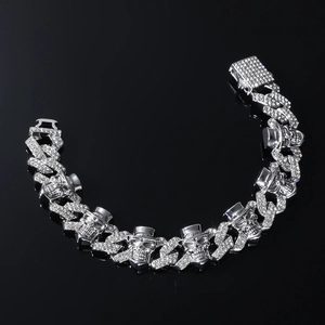 Men's punk skull Cuban link bracelet in silver finish with iced out crystal pavé setting
