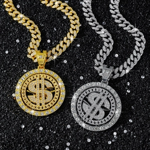 Detail of hip-hop gold and silver dollar pendants on thick cuban link chains