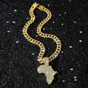 Iced out gold Cuban link chain necklace with a full diamond Africa map pendant