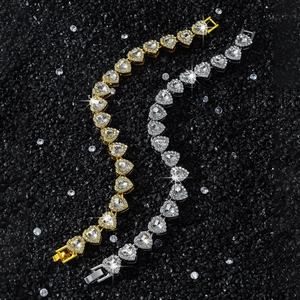 10mm heart link tennis bracelet in gold and silver finish with sparkling crystals